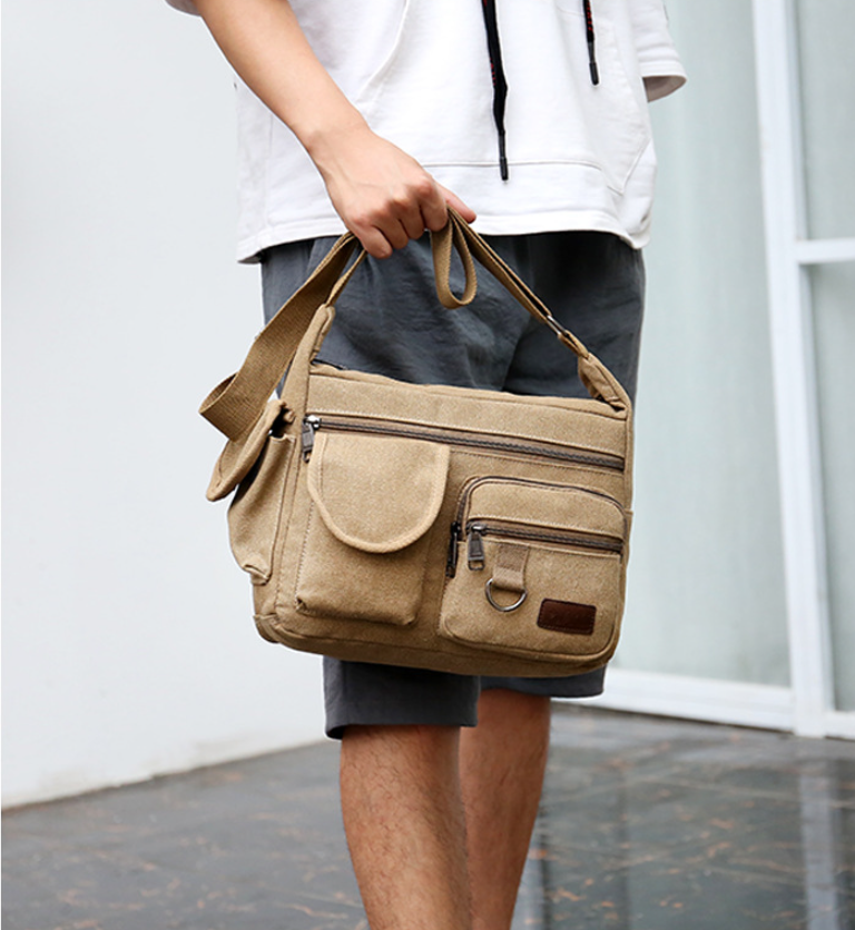 【男士出行必備】新款帆布男士單肩包 超大容量 多層斜挎 實用又高端 【男士出行必備】新款帆布男士單肩包 超大容量 多層斜挎 實用又高端